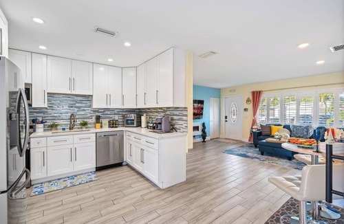 Golfview Harbor House | Waterfront Heated Pool Home w/Putting Green, Pergola & Air Hockey