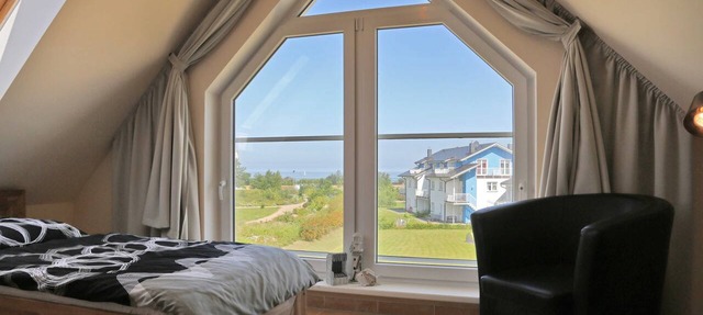 Beach Apartment with Fireplace · Balcony · 300 m from the Beach - Accommodation in Börgerende-Rethwisch