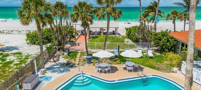 Bright and Sunny Oceanfront Villa With Pool + Lanai | Hosts 6 in Longboat Key