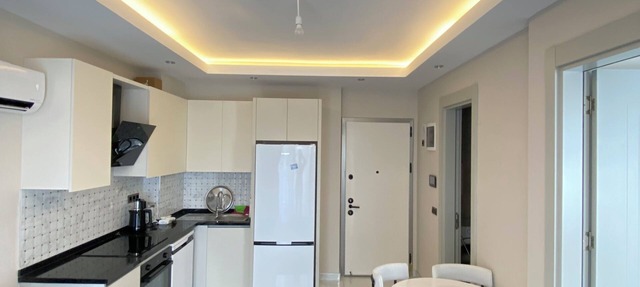 Cozy 1-bedroom apartment in peaceful Antalya with AC and gym access in Antalya