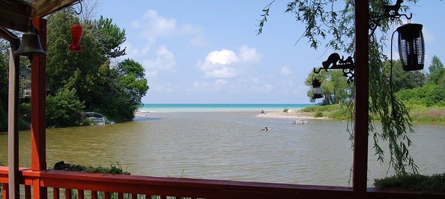 Cozy rustic cottage on Nine miles river, viw of Huron Lake sunset. Pet friendly in Goderich
