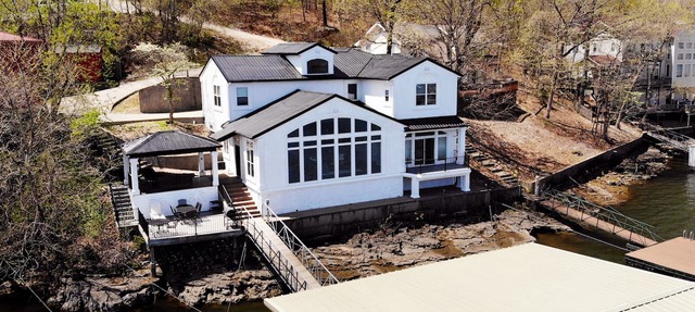Executive Getaway close to all the action with Private 2 slip dock in Sunrise Beach