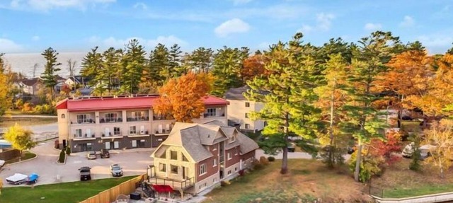 EXECUTIVE WATERFRONT LIVING AT ITS FINEST! WELCOME to this immaculate home! in Wasaga Beach