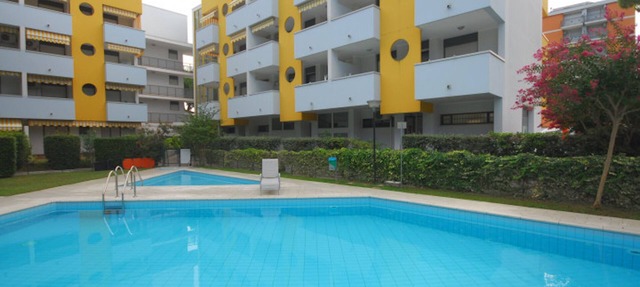 Flat with balcony and shared pool in Lignano Sabbiadoro