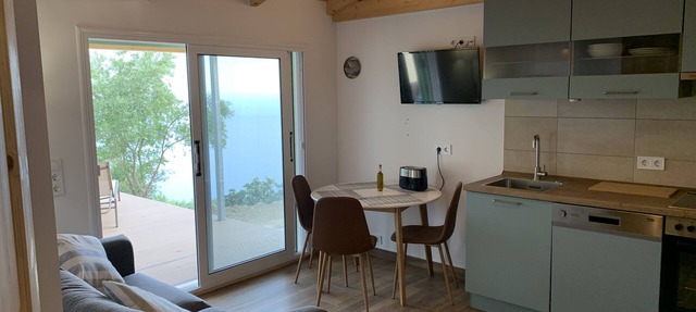 Former studio with a gigantic view of the sea - almost energy self-sufficient! in Vrachos