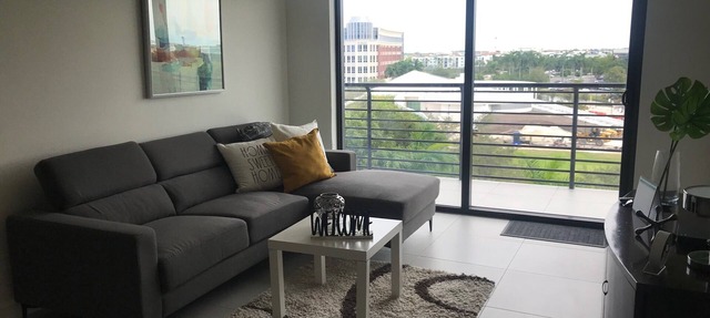Modern building, centrally-located condo,2 bedrooms/2 bathrooms, parking space. in Doral