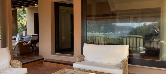 Sardinian villa 200 meters from the sandy beach with sea view, parking, air conditioning, garden in Porto Sa Ruxi