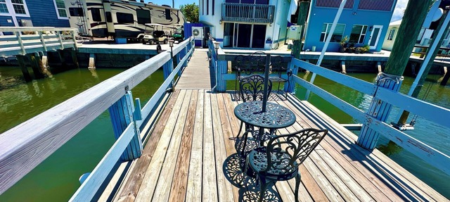 Waterfront, Dock, Beach Access 2Bed 3 Bath home in the beautiful Nettles Island, (N373) in Jensen Beach
